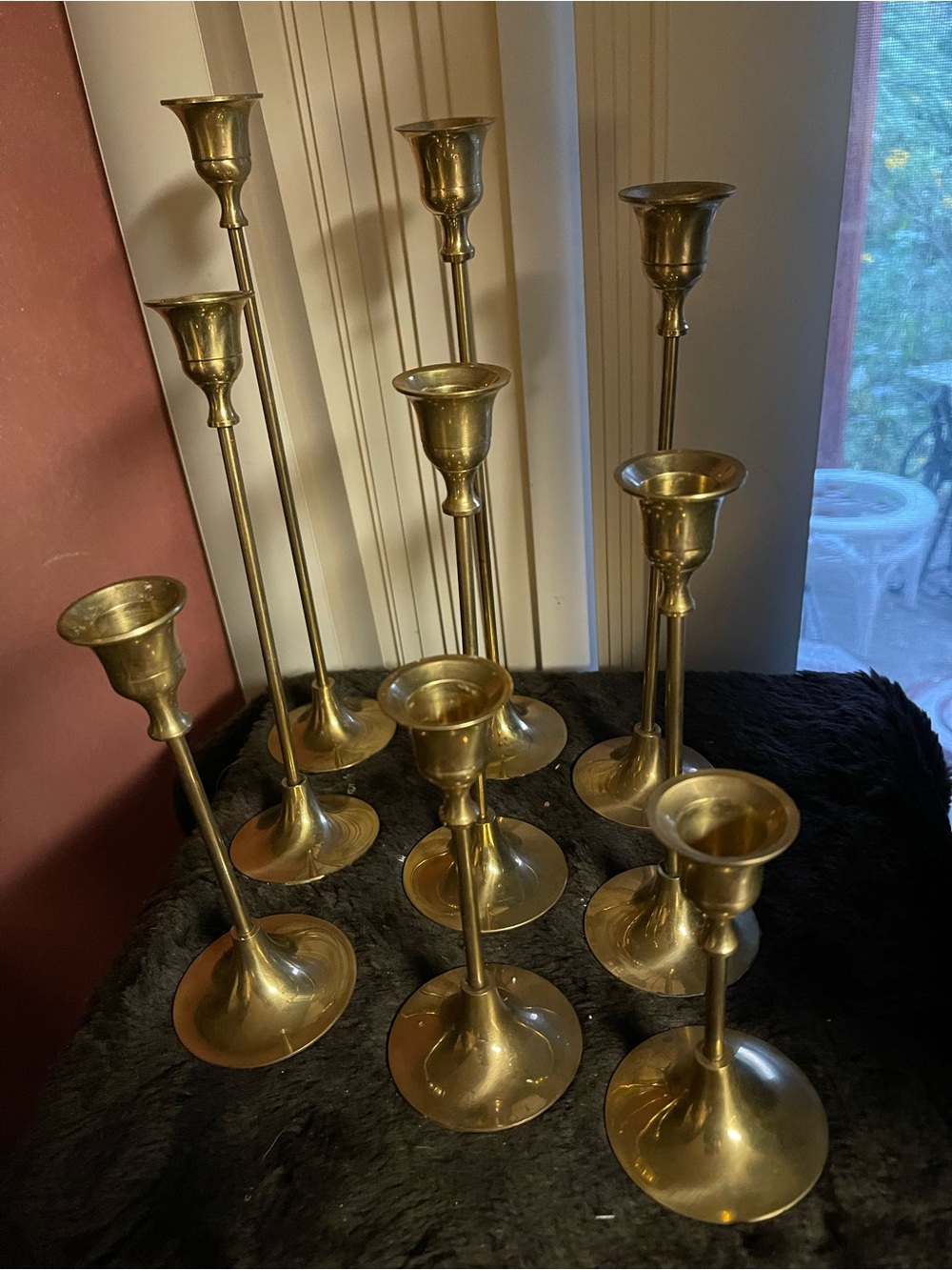 Set of 9 graduated brass candlesticks- vintage